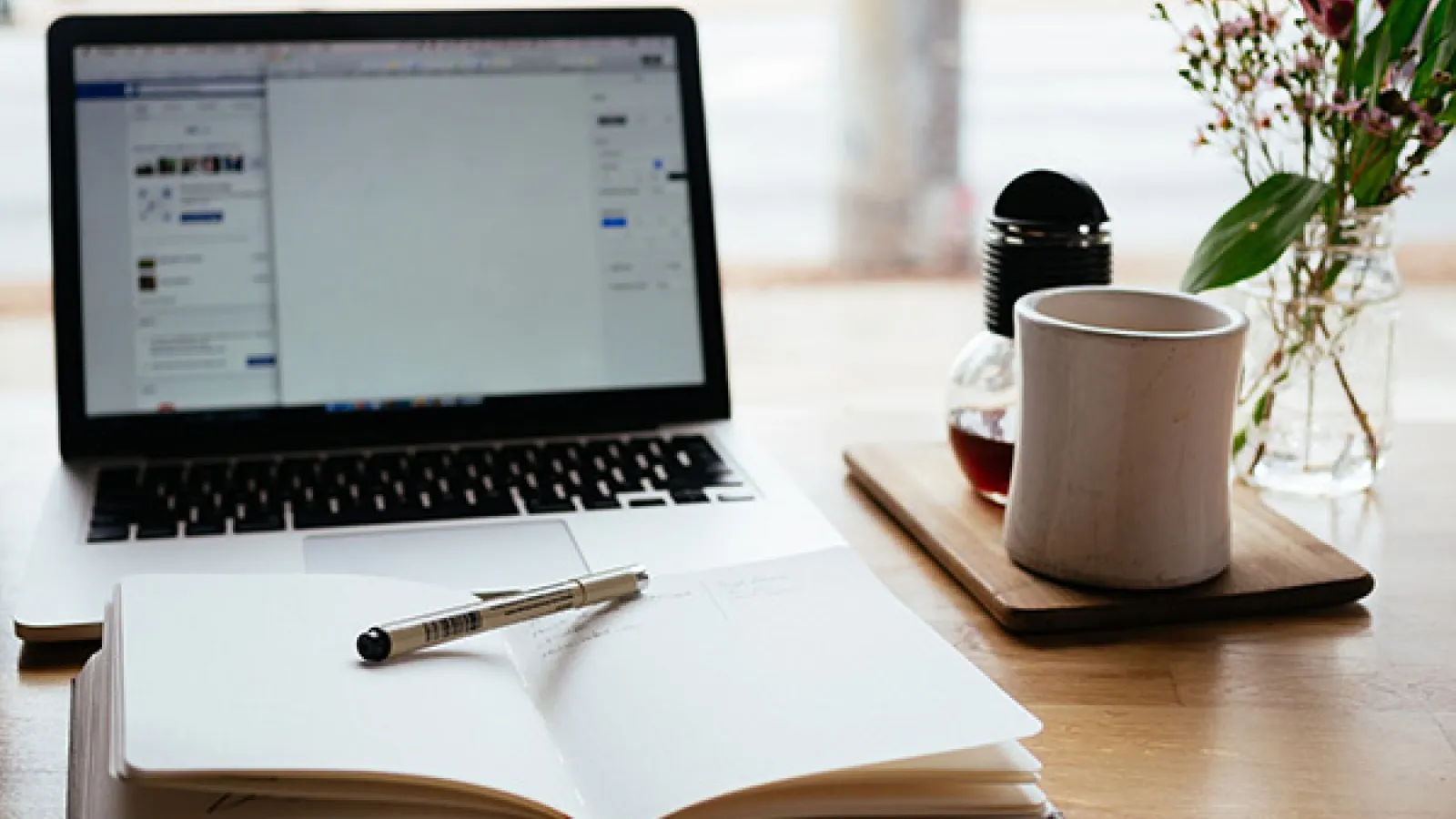 Open laptop and book
