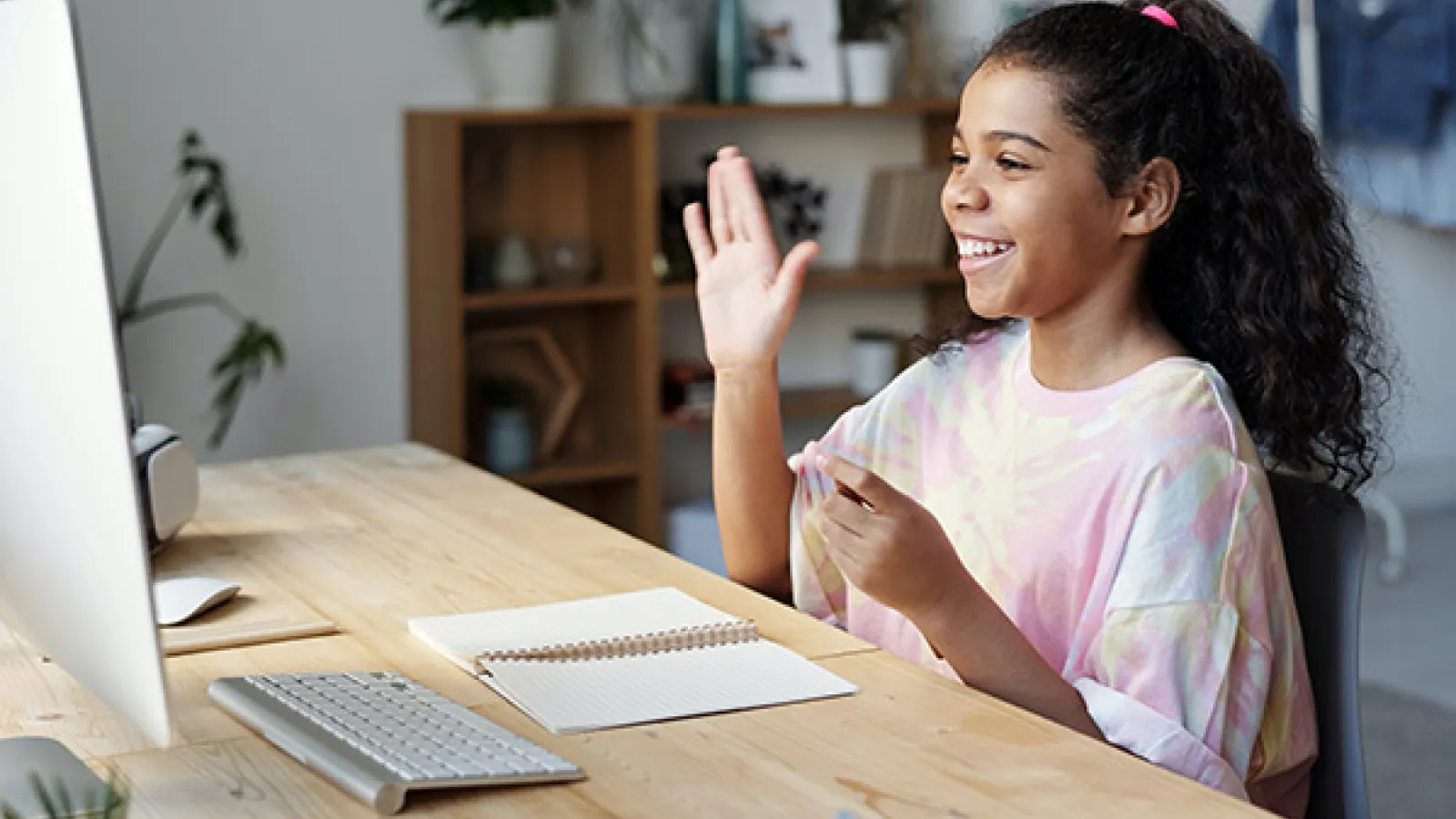 Student studying online at computer