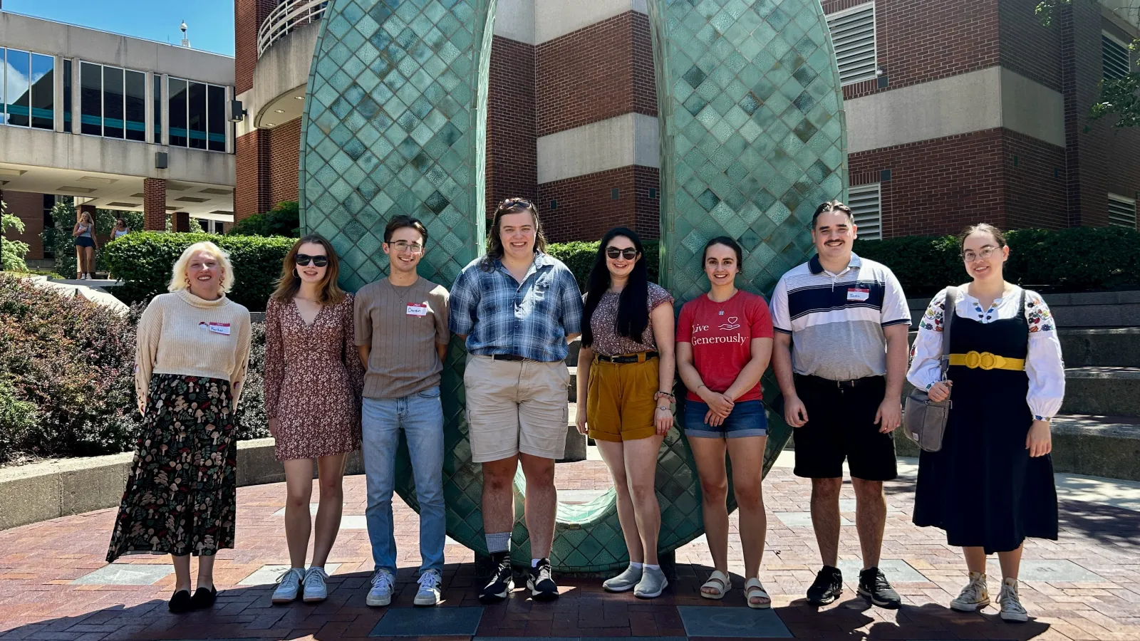 CSEEES MA students in front of the Oxley number statues