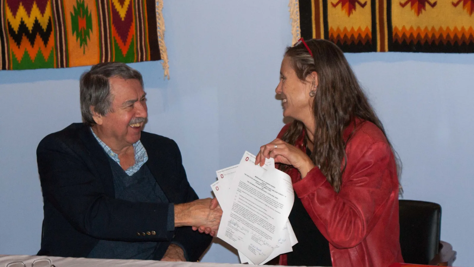 Dr. Angela Brintlinger and UMA Director Andrew Fedynsky with signed Memorandum of Understanding 